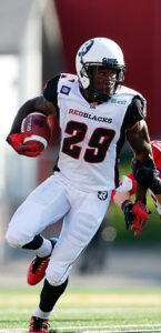 Image of Ottawa REDBLACKS player Chevon Walker running with the ball