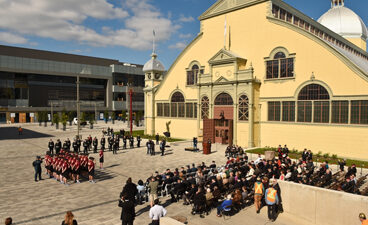 Image of a ceremony taking place in front of the Aberdeen Pavilion Event Square at TD Place