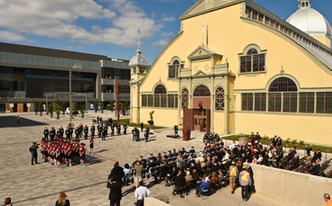 Image of a ceremony taking place in front of the Aberdeen Pavilion Event Square at TD Place