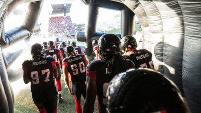 Ottawa REDBLACKS players getting ready to exit
