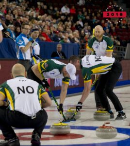 Image of curlers playing in the Davis Cup on the ice in the arena at TD Place in 2016