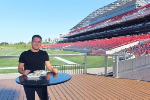 Image of a male standing in the Log Cabin in the Stadium at TD Place
