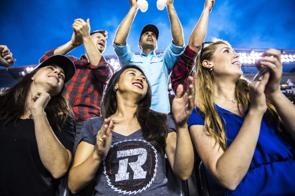 Image of Ottawa REDBLACKS fans cheering at the game