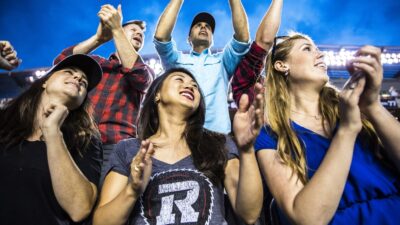 Image of Ottawa REDBLACKS fans cheering at the game