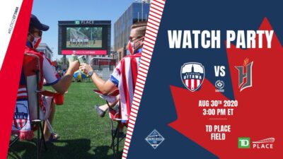 Image of Atlético fans watching the match on the large screen at TD Place promoting the watch party