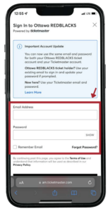 mobile phone with ticketmaster screen - login credentials form