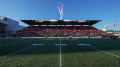 The Stadium at TD Place with fans on the north stand and fireworks