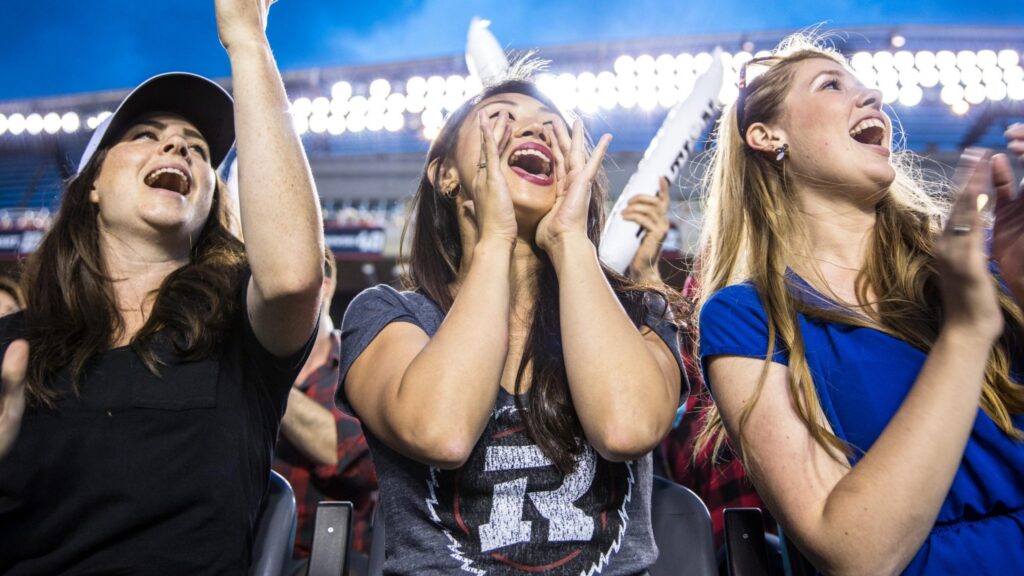 REDBLACKs women fans cheering at The Stadium