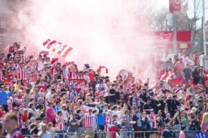 Fans celebrating at an Atletico game at TD Place in Ottawa