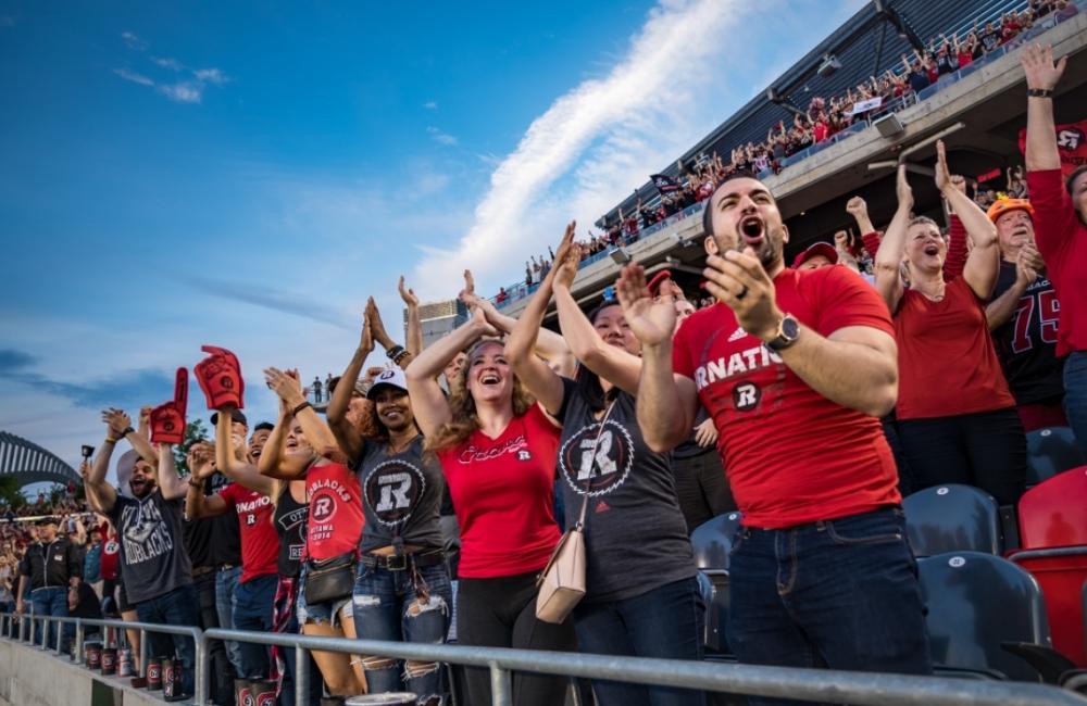 redblacks fans at a game cheering