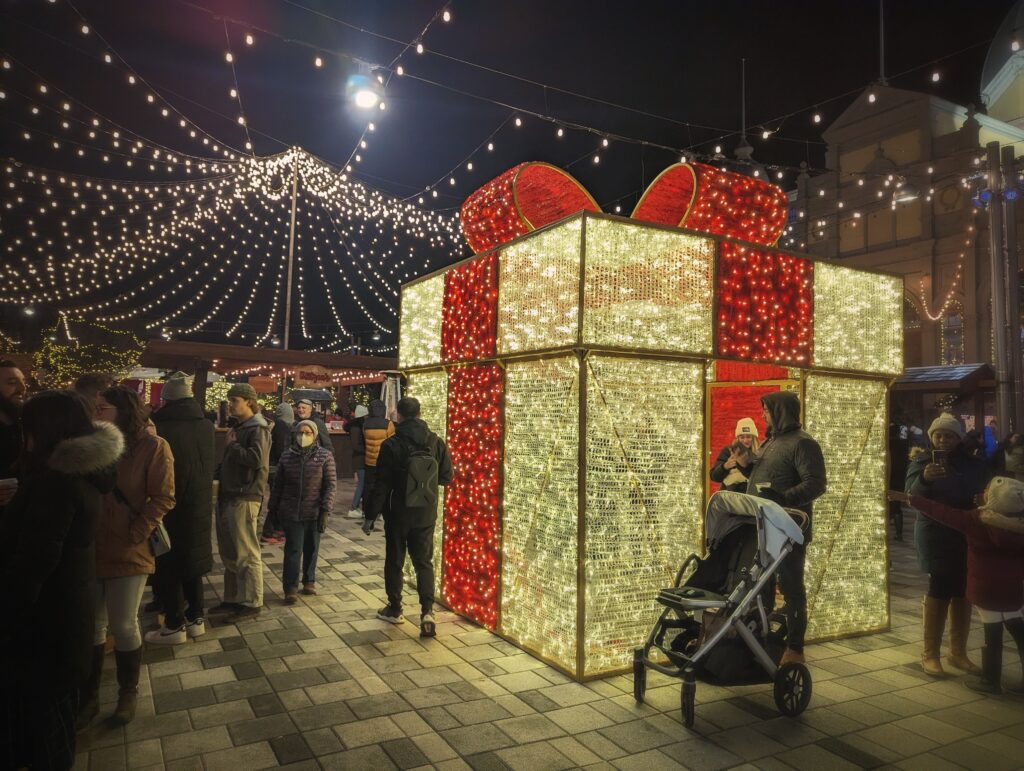 People at the Ottawa Christmas Market at night.